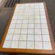 Dining table or farmhouse kitchen style with solid wood and tiles.