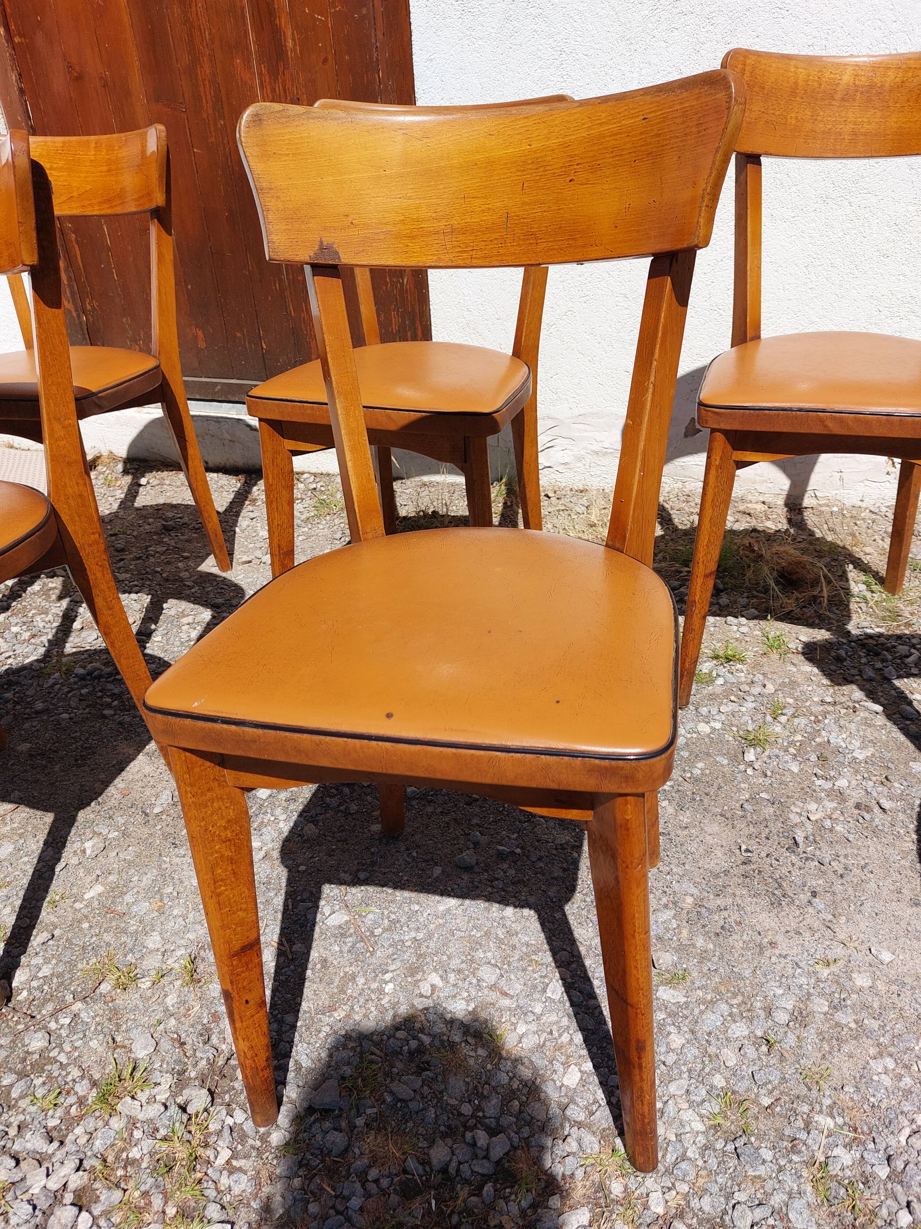 6 vintage 1960s wooden bistro chairs with camel faux leather.