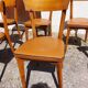 6 vintage 1960s wooden bistro chairs with camel faux leather.