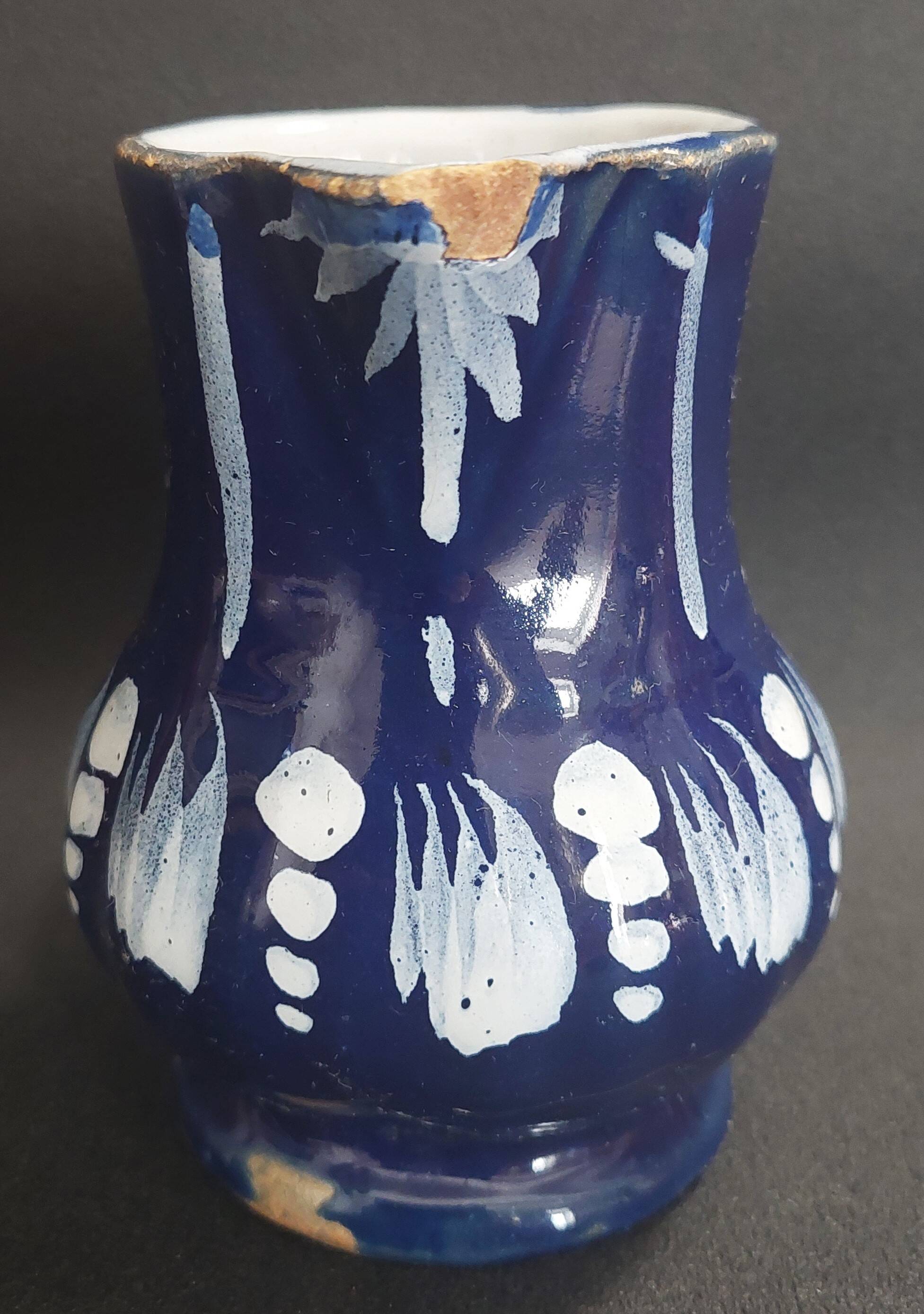 Earthenware pitcher from the North of France with blue covering, 19th century