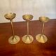 Suite of 3 vintage brass candle holders