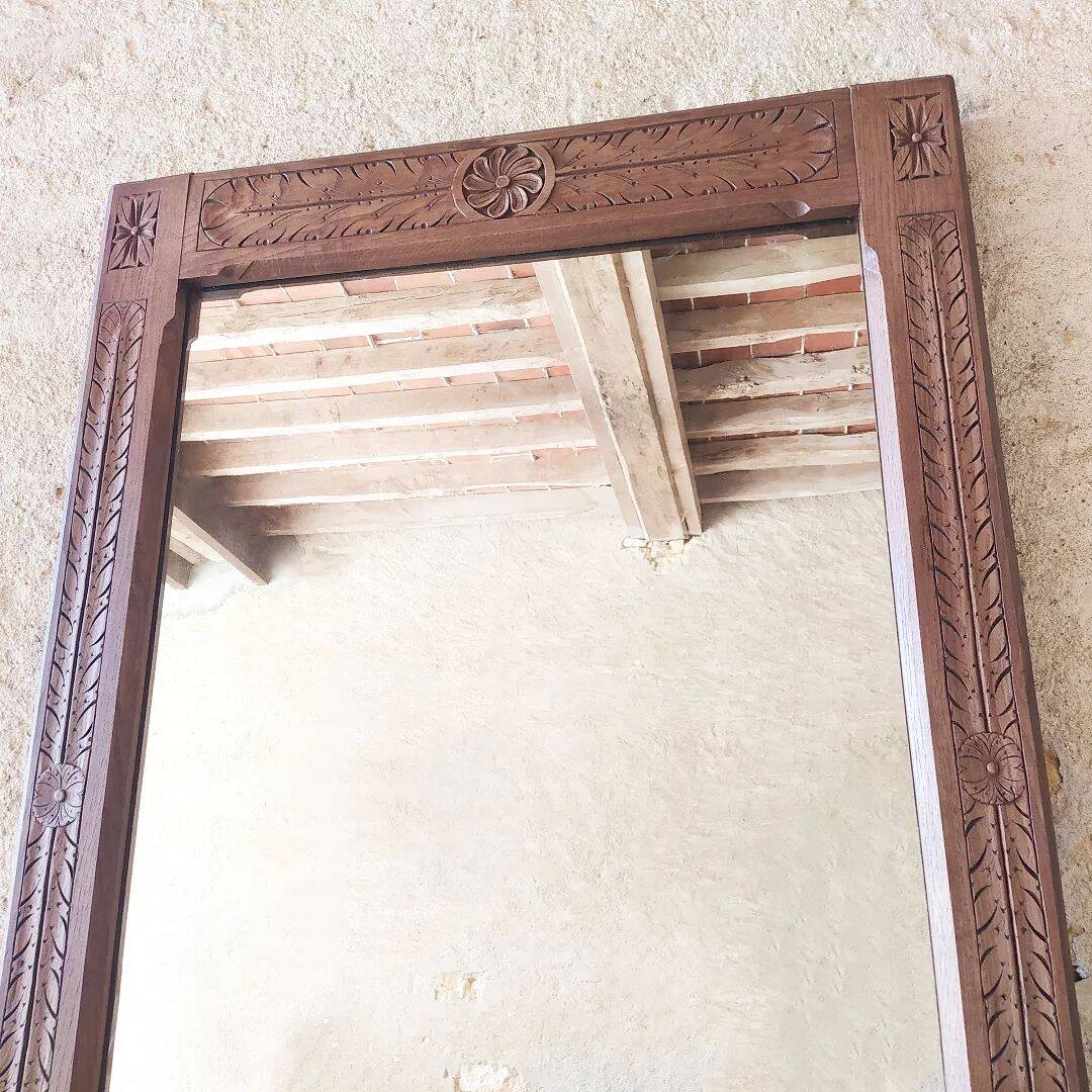 Carved wooden mirror