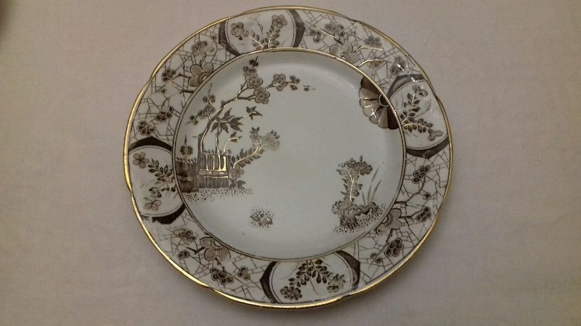 Set of 11 plates and 11 earthenware cups