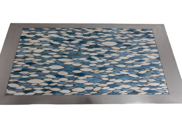 Polished metal and ceramic dining table. 1970s.