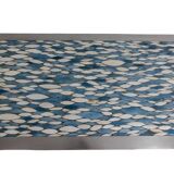 Polished metal and ceramic dining table. 1970s.