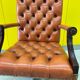 Vintage orange leather buttoned back gainsborough swivel desk chair from 1980