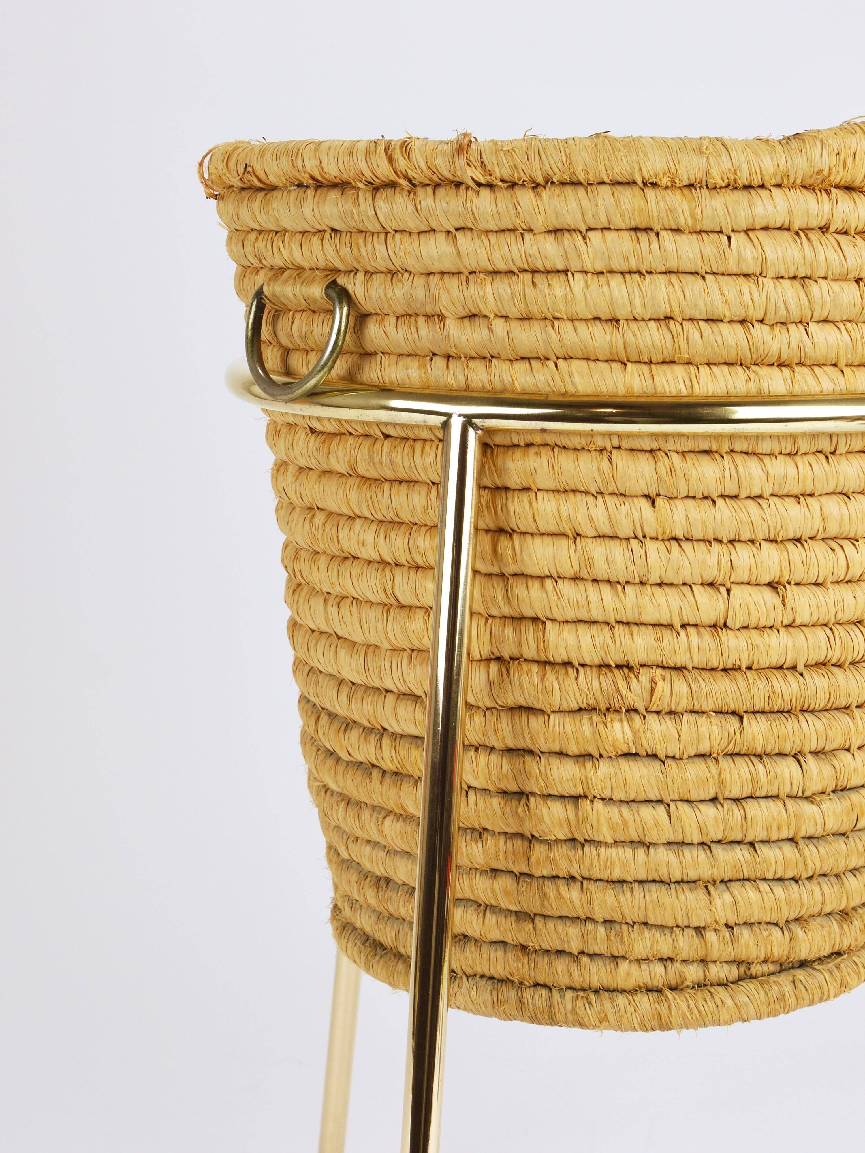 Carl Auböck II paper basket in raffia and brass, umbrella stand, 1950s