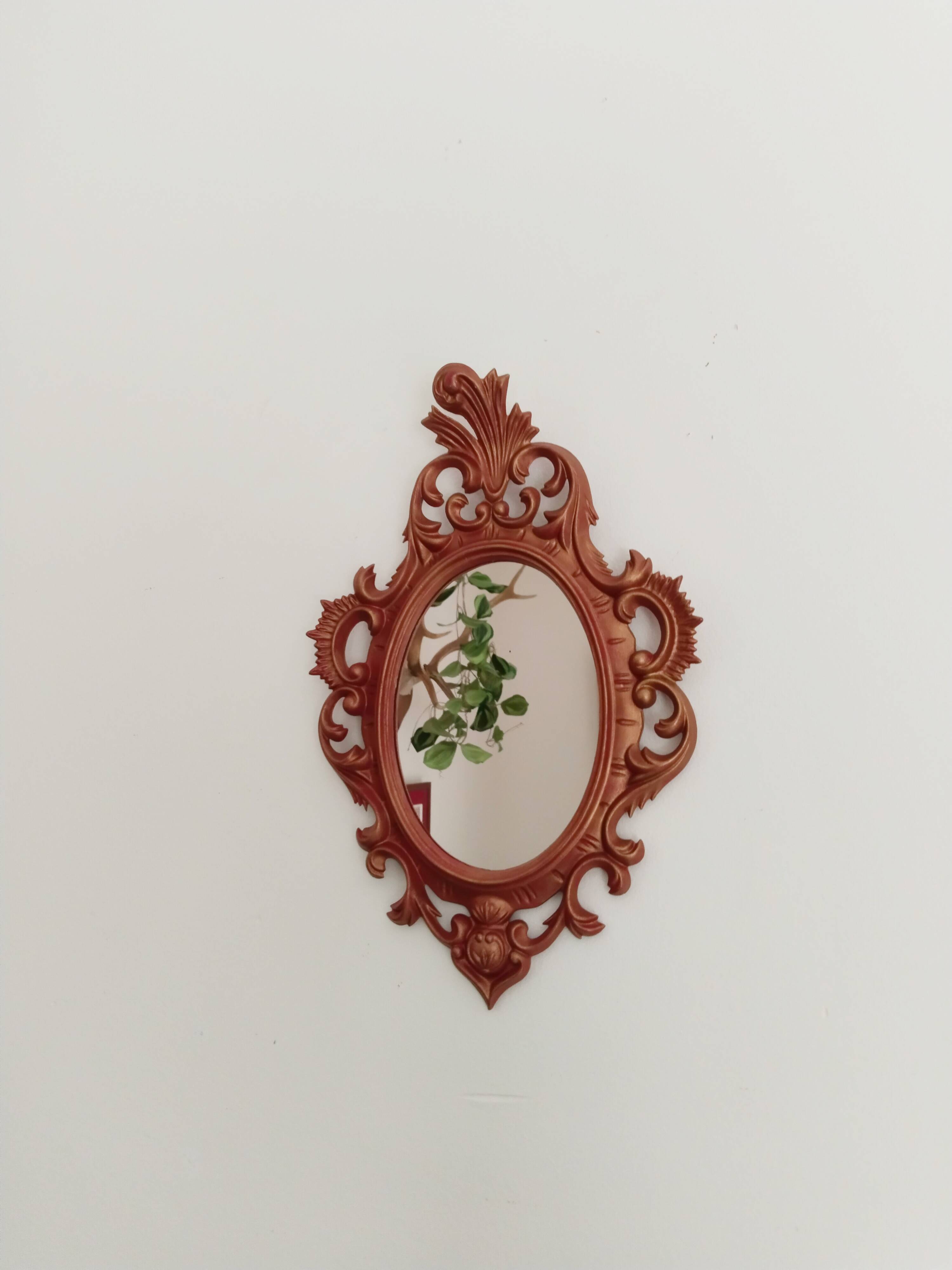 Classic red and gold patinated rocaille mirror, 35 cm x 23 cm