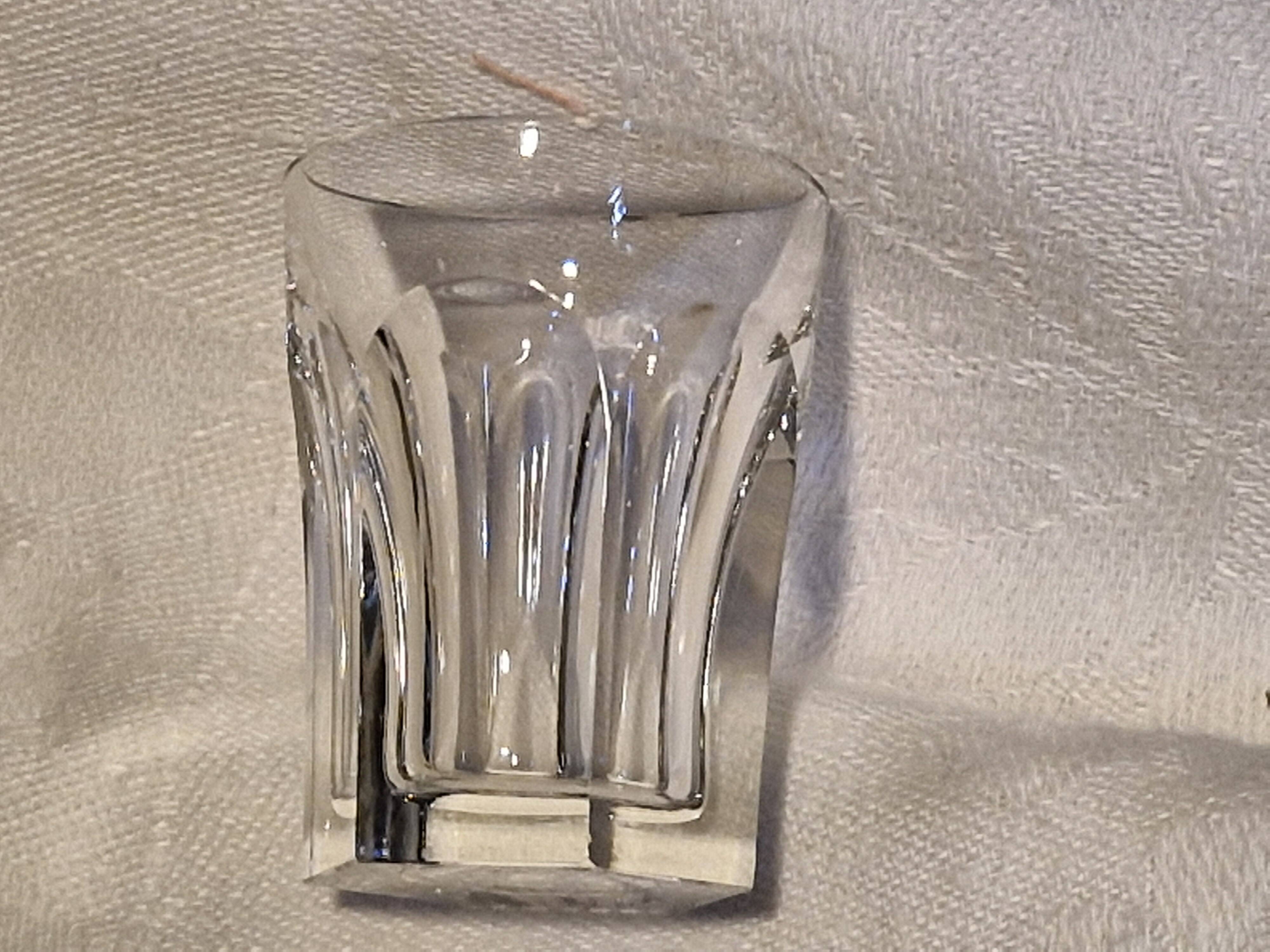 Baccarat 7 crystal liqueur glasses signed Model Harcourt on a stand.