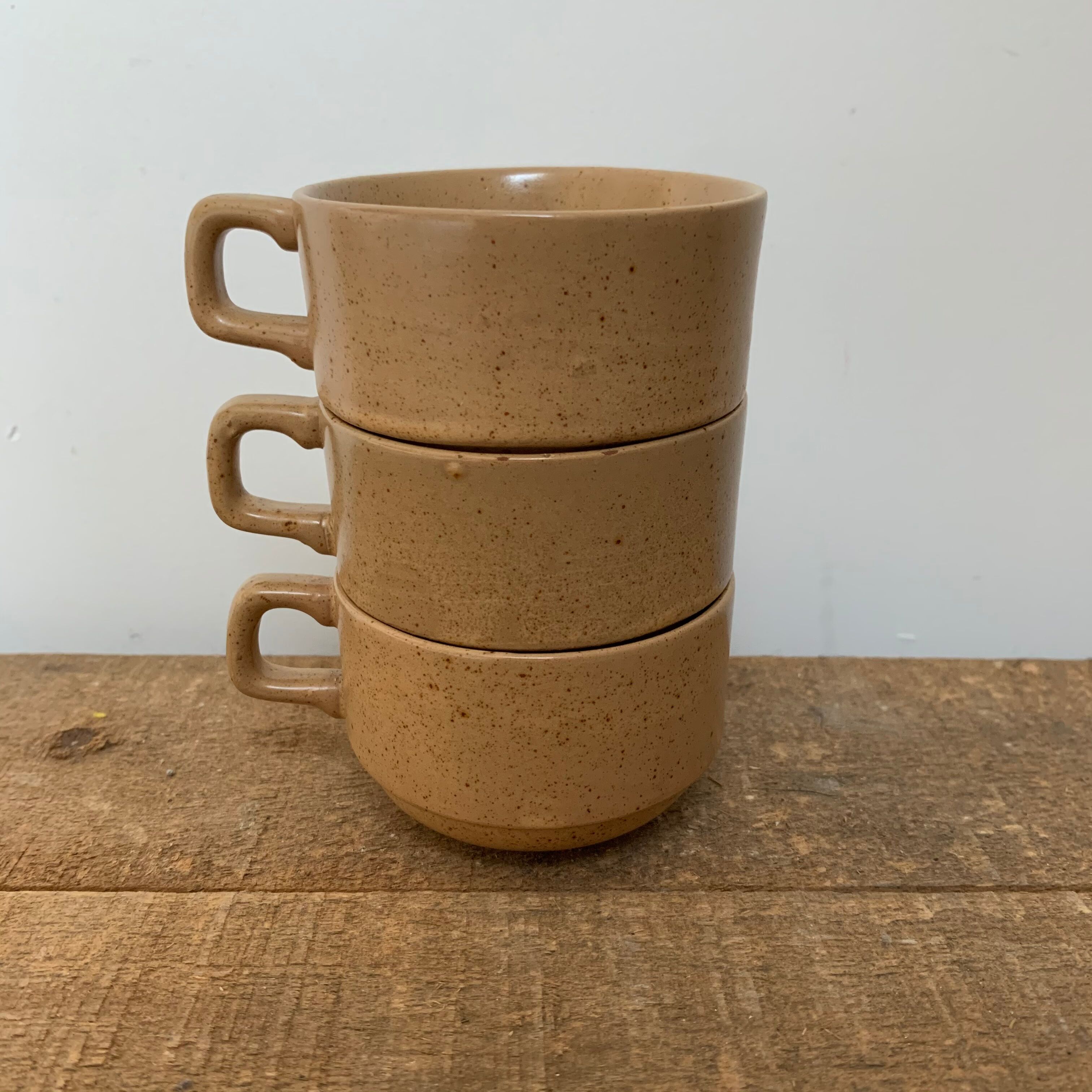 Coffee cups in sandstone