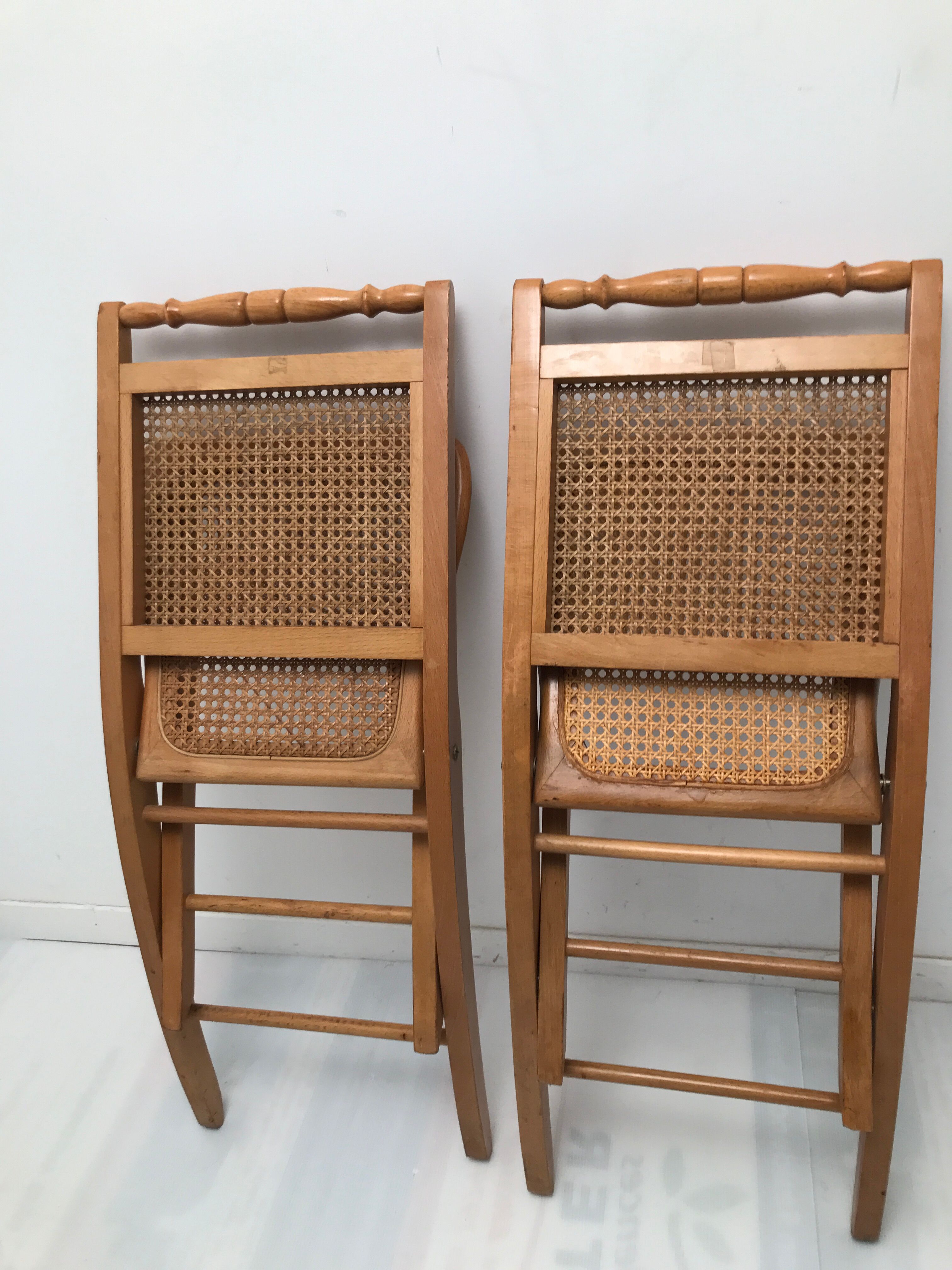 Pair vintage cannesy folding chairs