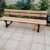 Garden bench with old cast iron legs