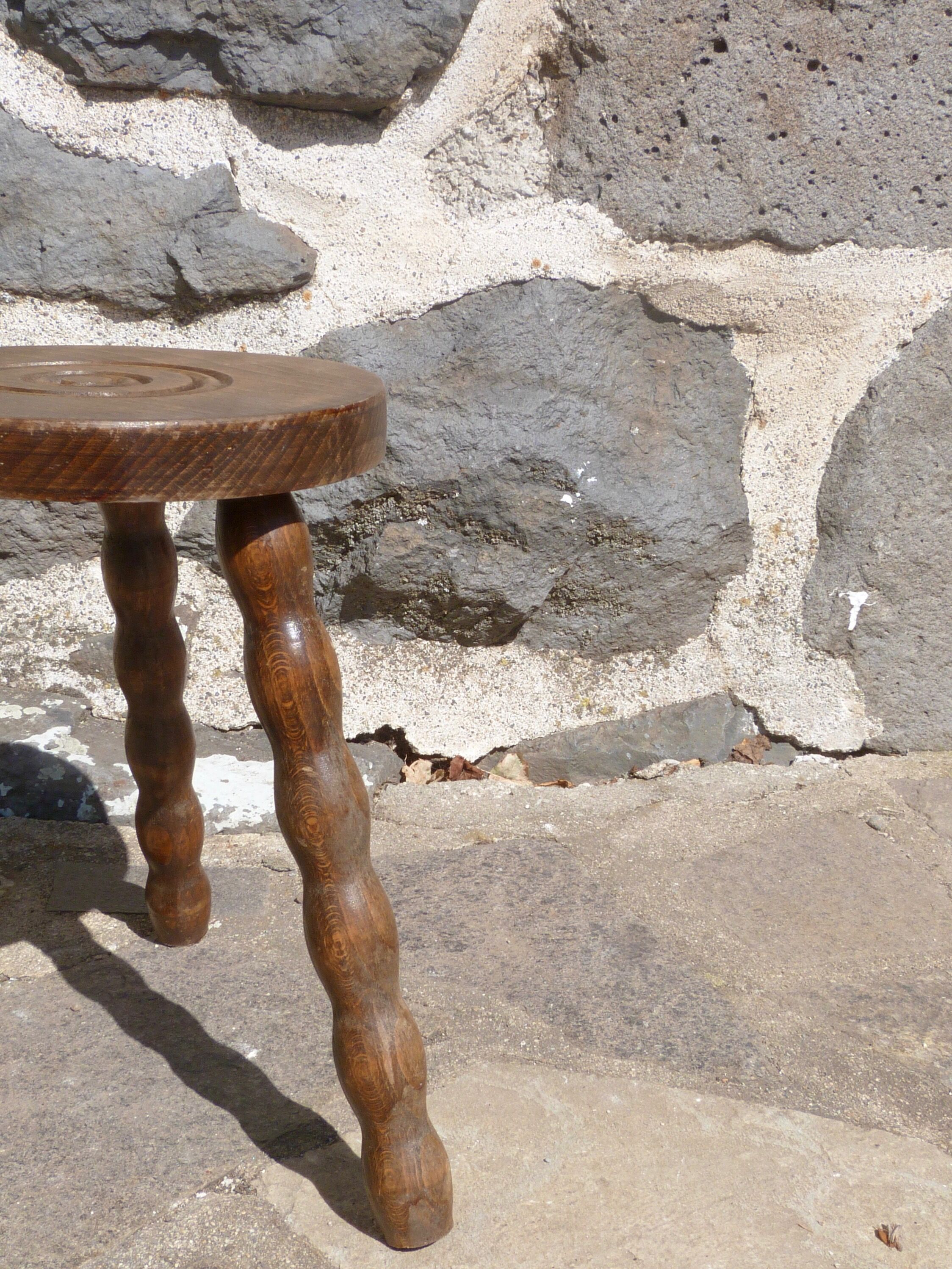 Tripod stool in turned wood