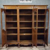 Large Provençal library in Louis XV style made of oak from the 20th century.