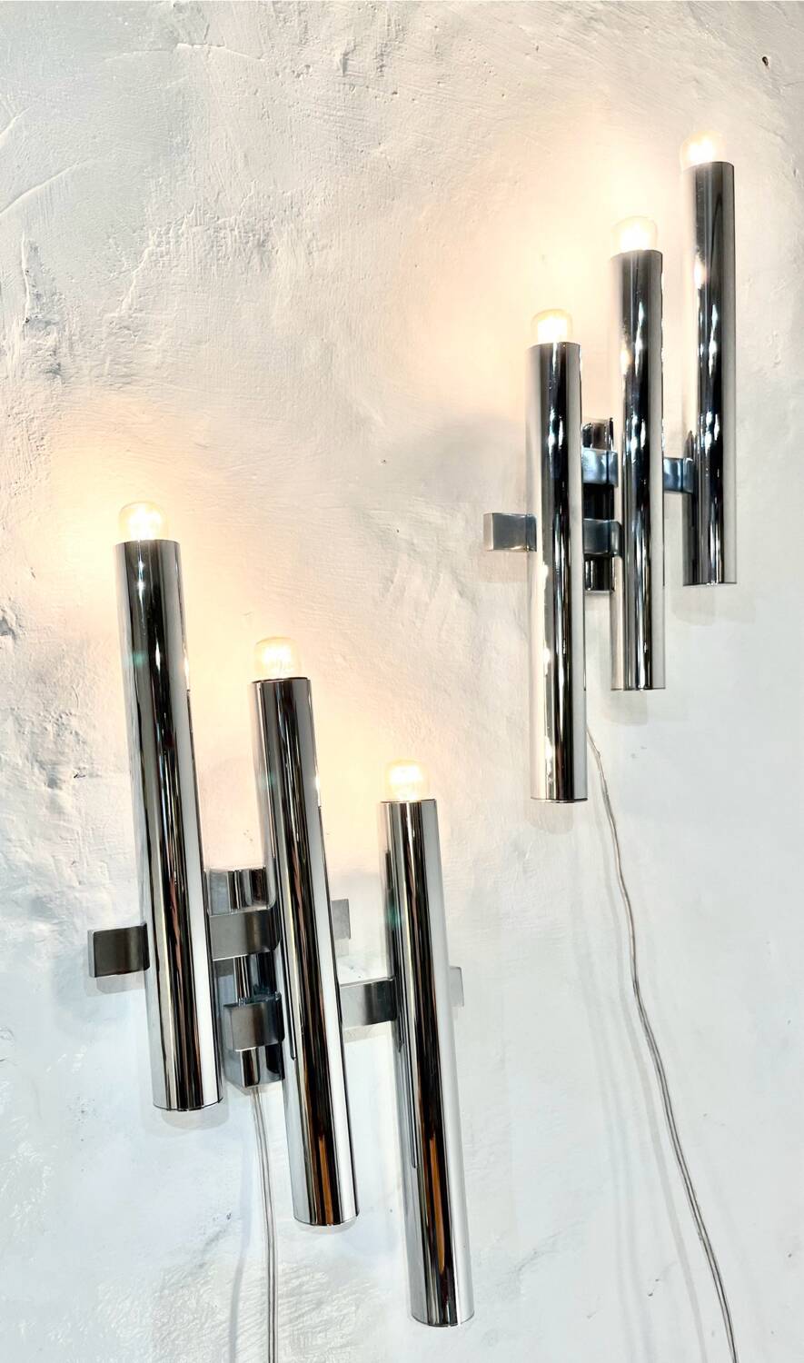Pair of chrome wall lights by Gaetano Sciolari, 1970's