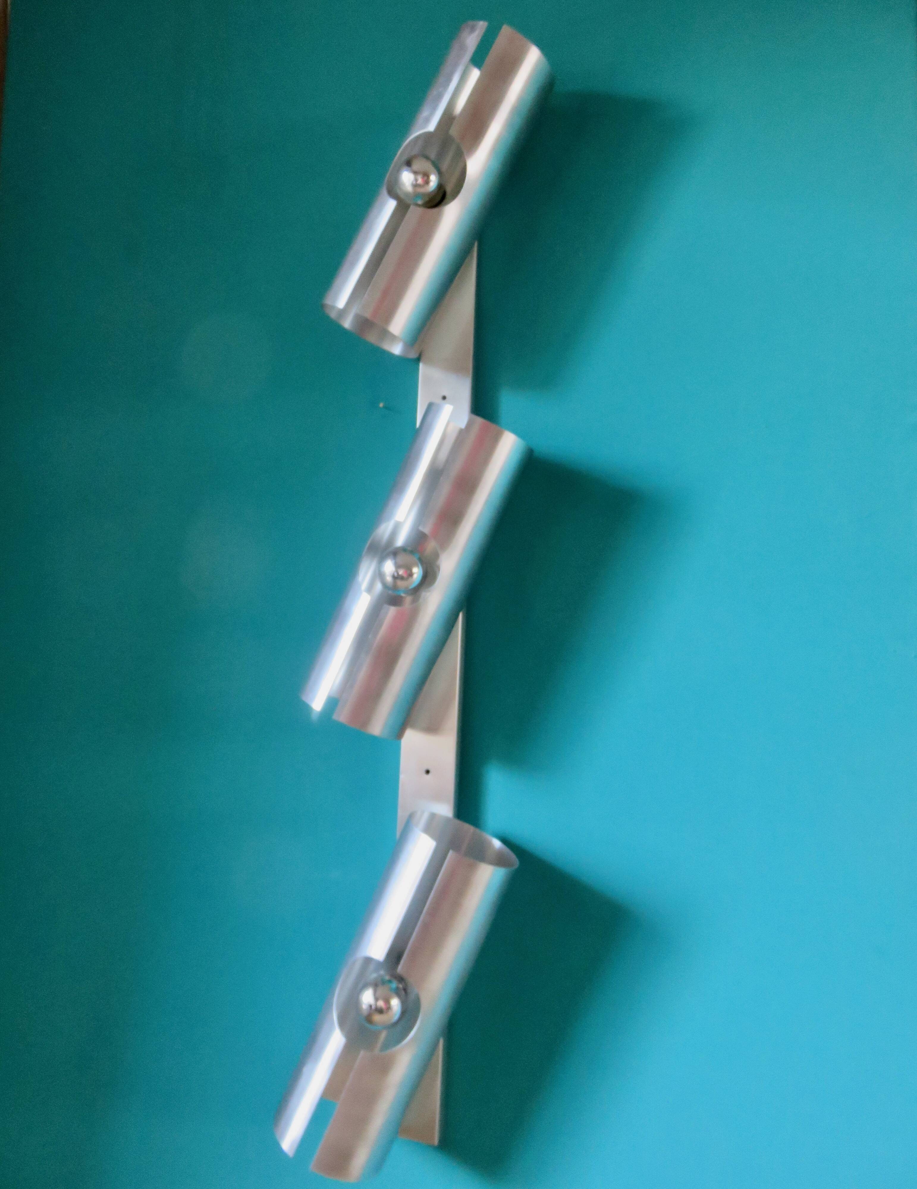 Long "SpaceAge" wall lamp in brushed aluminum. France 1970