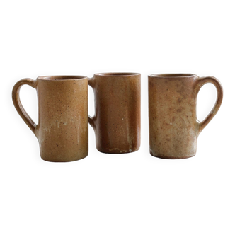 3 large stoneware mugs.