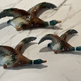 Mid century graduating flying ducks