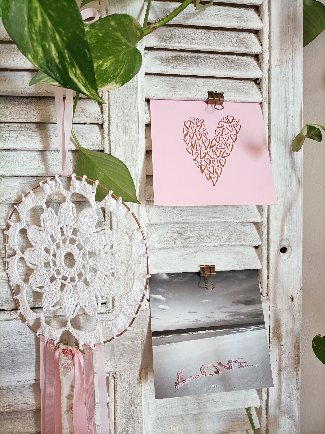 Vintage shutter renovated into a coat rack