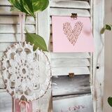 Vintage shutter renovated into a coat rack