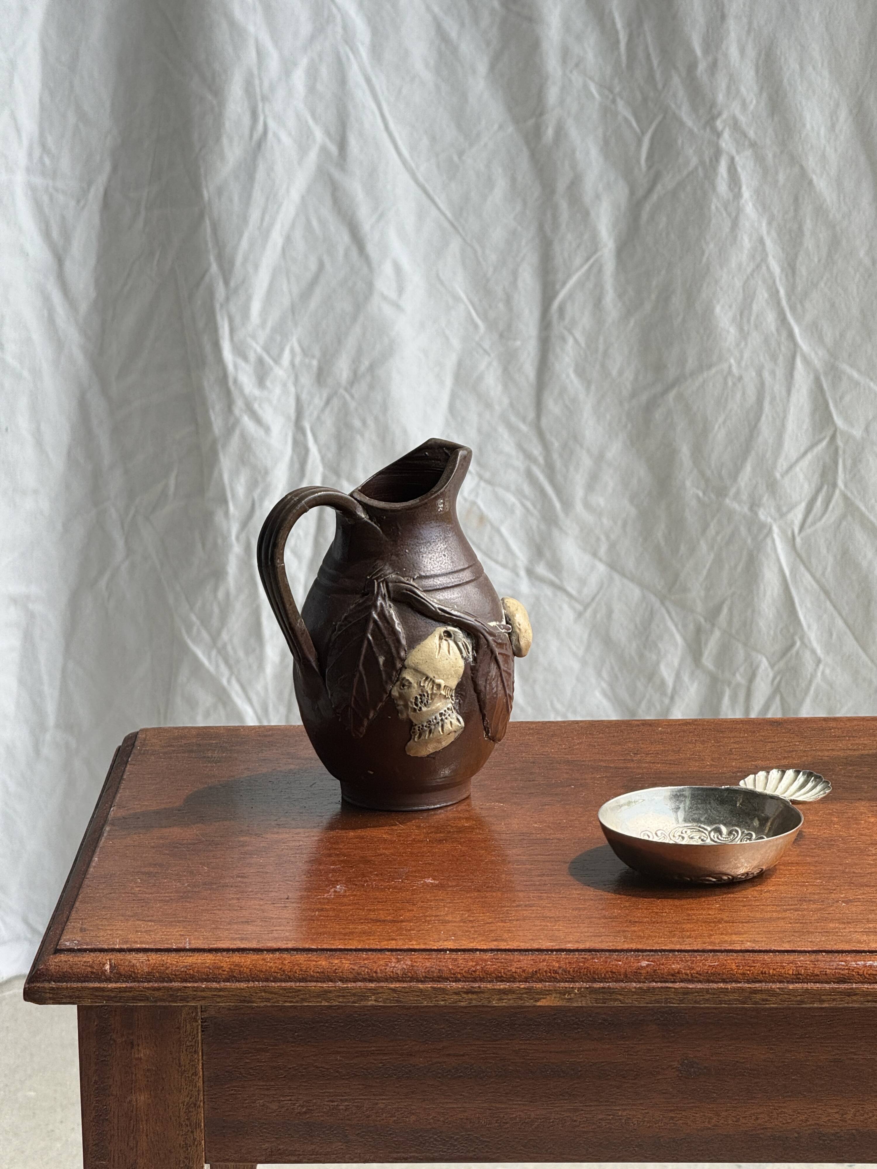 Turgis brown figurative motif mini jug, Noron la Poterie