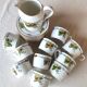 10 tea cups and creamer in Limoges porcelain