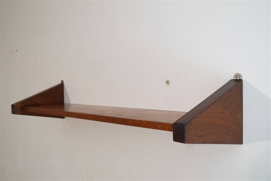 Minimalist mahogany shelves from the 1960s.