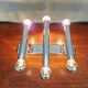 Tubular wall light in chromed metal