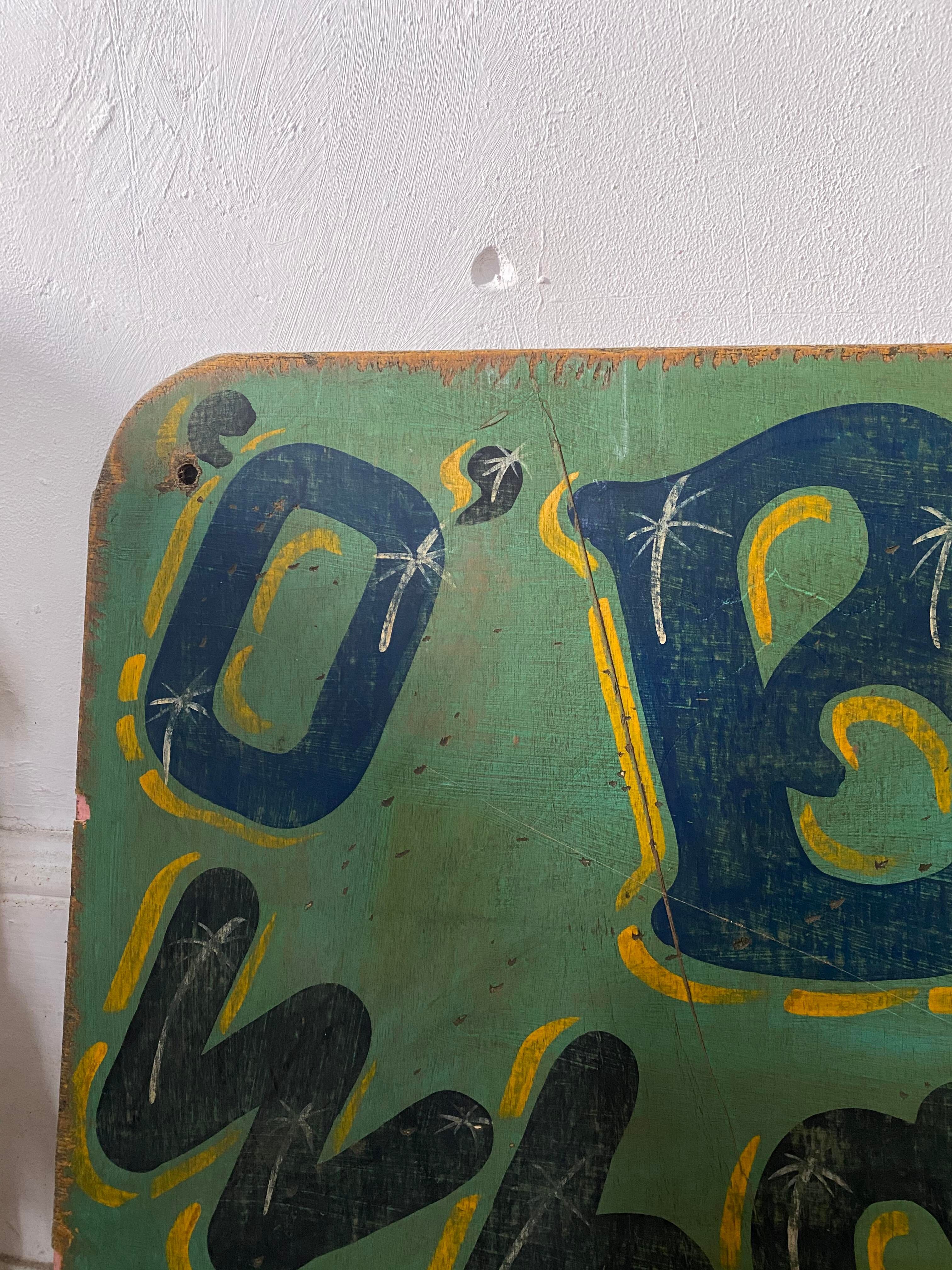 Painted amusement park or funfair sign