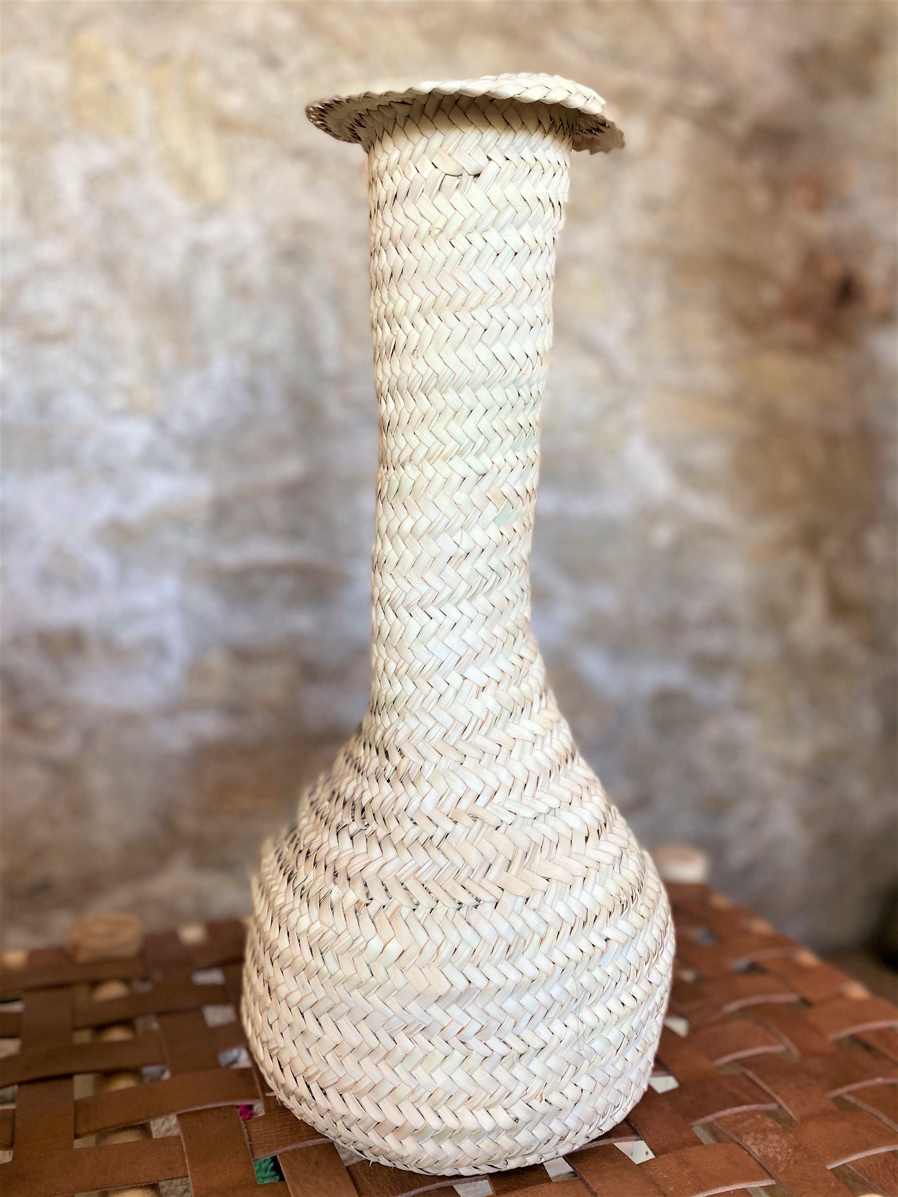 Vase made of palm leaves