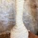 Vase made of palm leaves