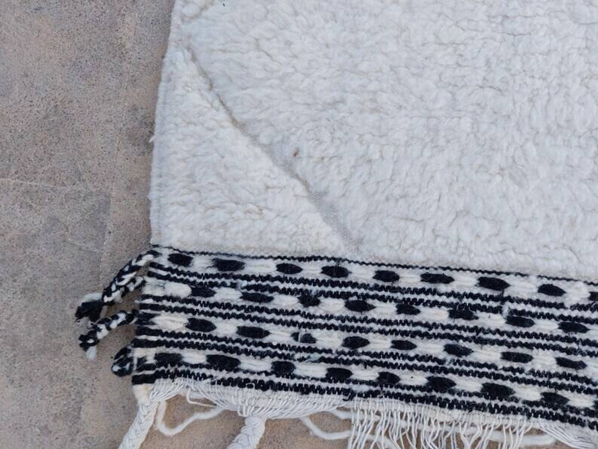 Tapis blanc en laine naturelle