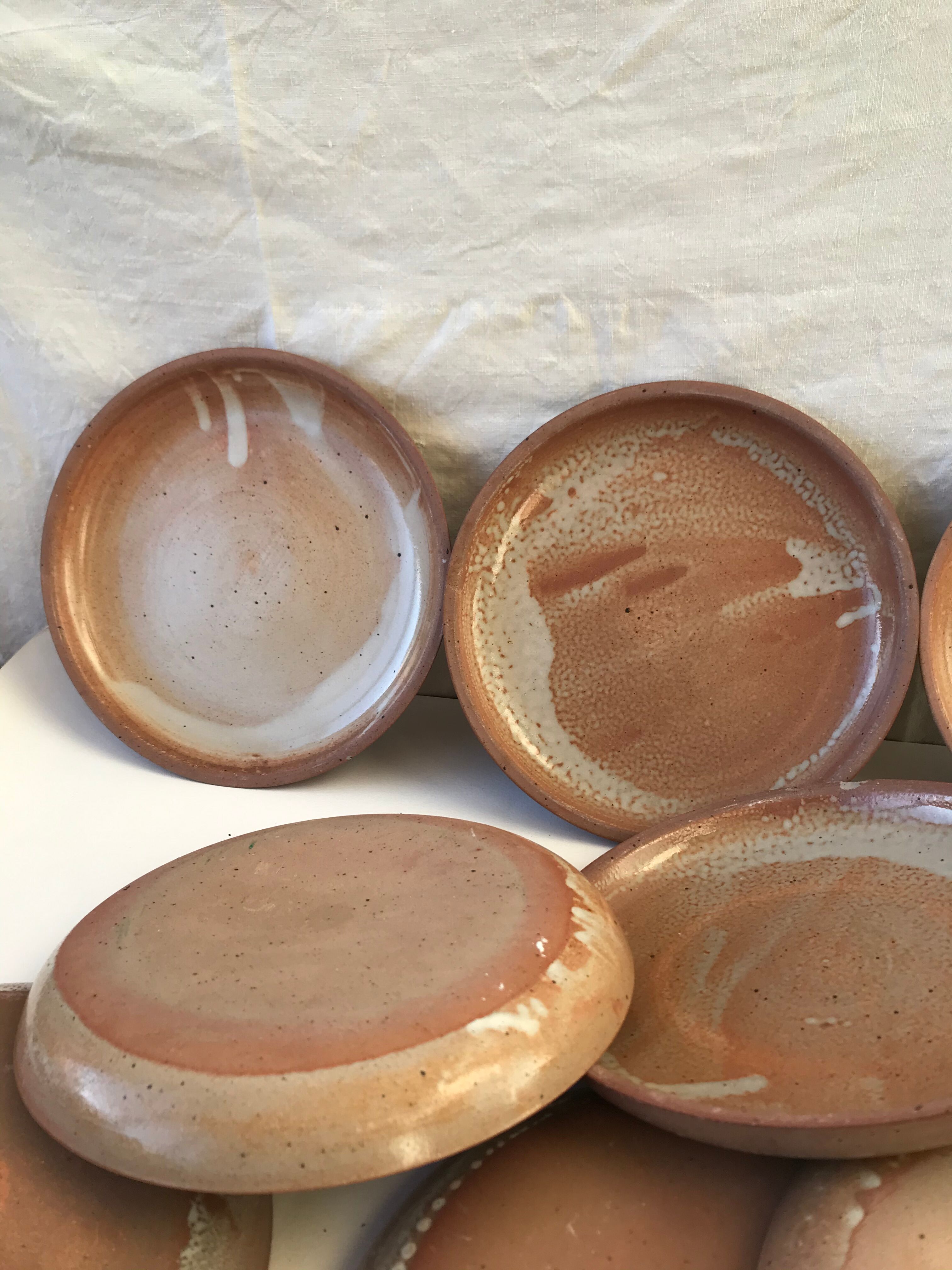 10 small plates made of vintage sandstone