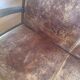 Vintage colonial-style bench in solid wood and patinated leather.