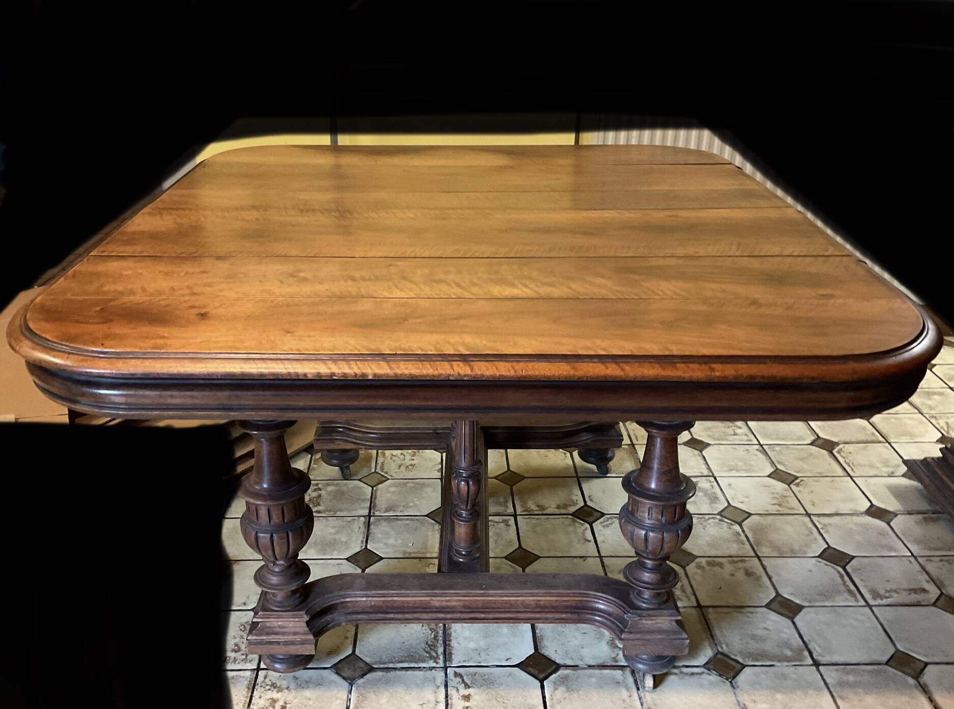 Extendable wheeled table henri ii, second half of the 19th century, solid walnut.