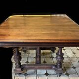 Extendable wheeled table henri ii, second half of the 19th century, solid walnut.