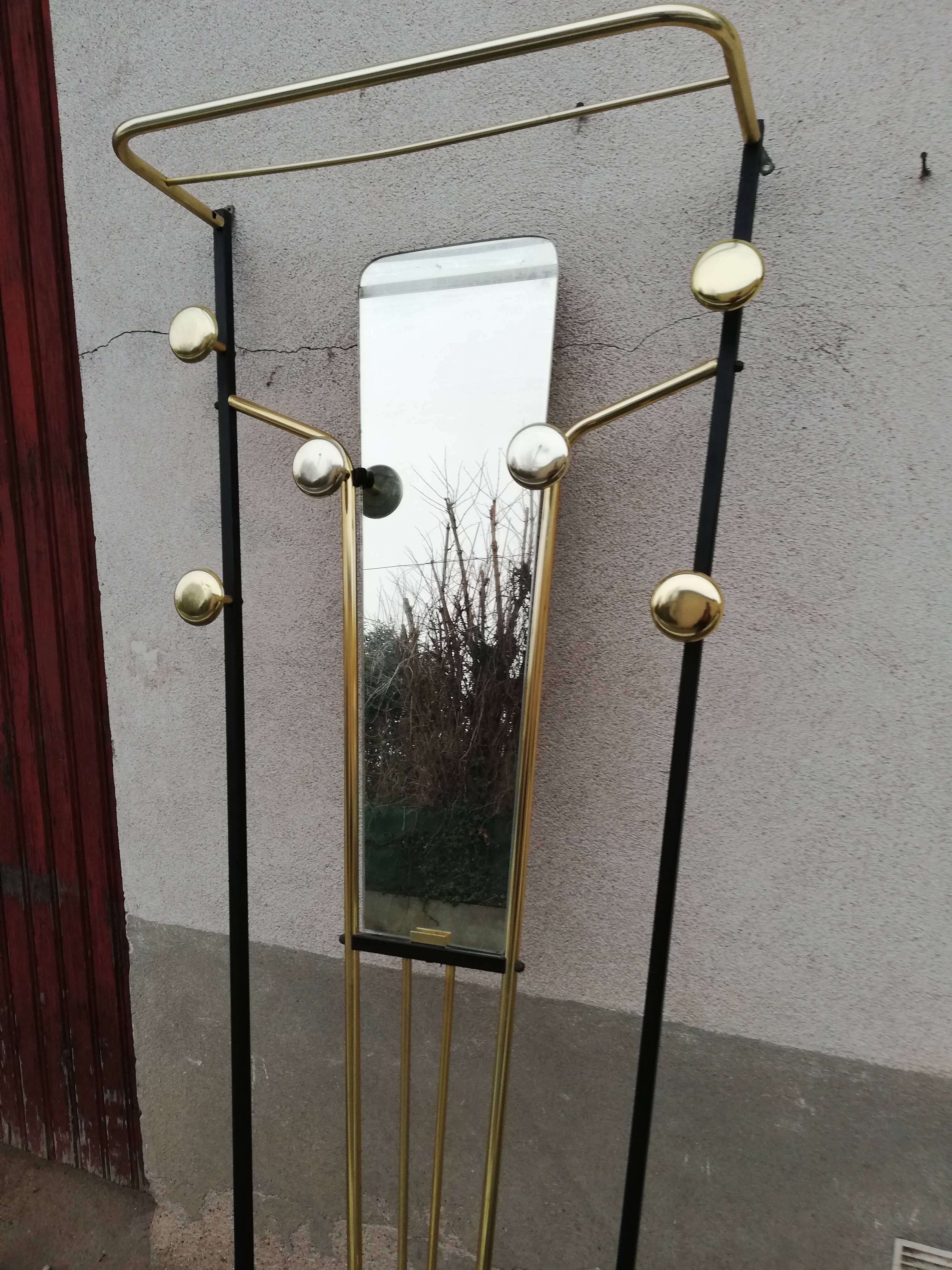 Black and gold vintage wall coat holder