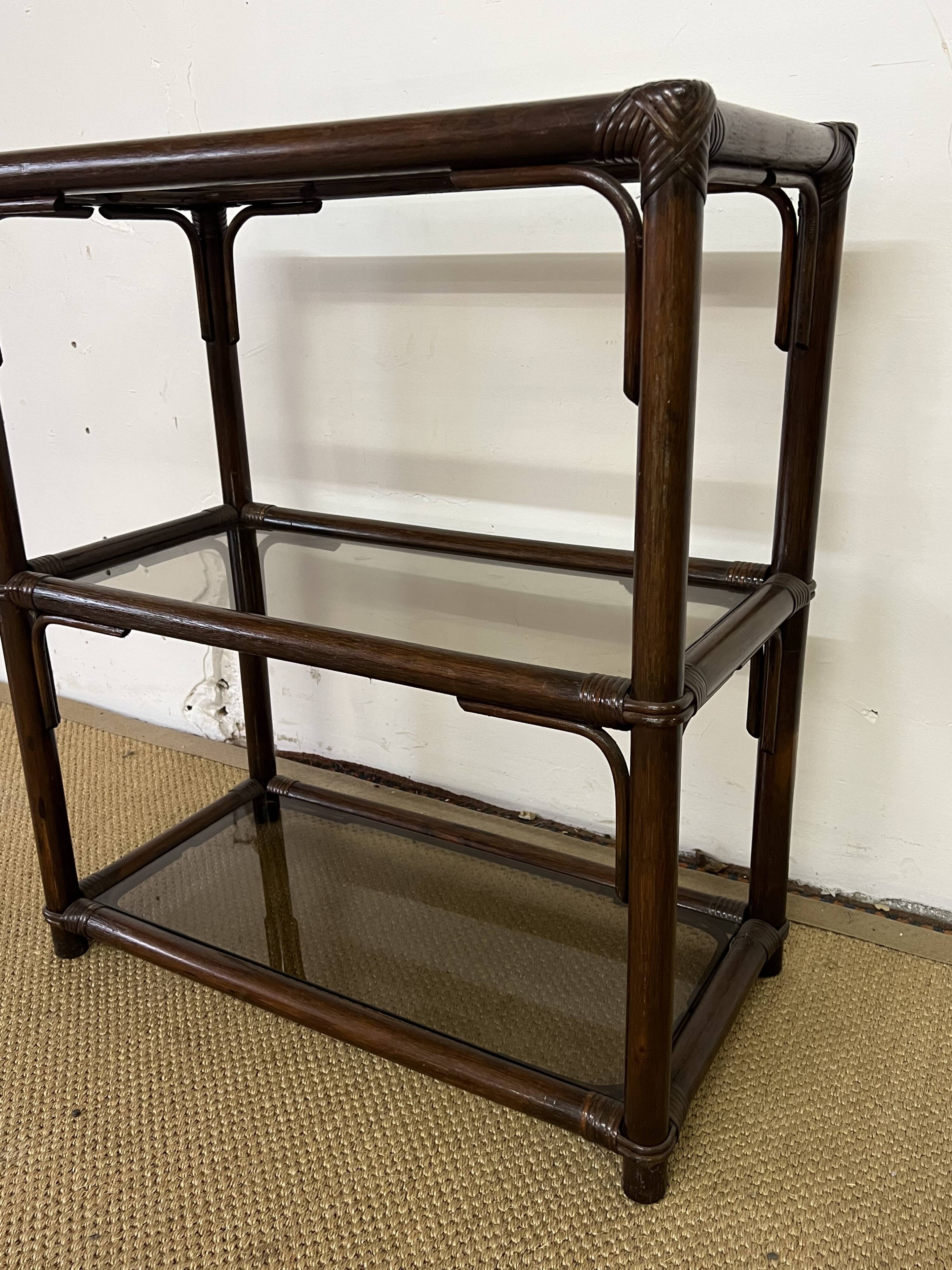 Rattan and smoked glass bookcase shelf