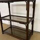 Rattan and smoked glass bookcase shelf