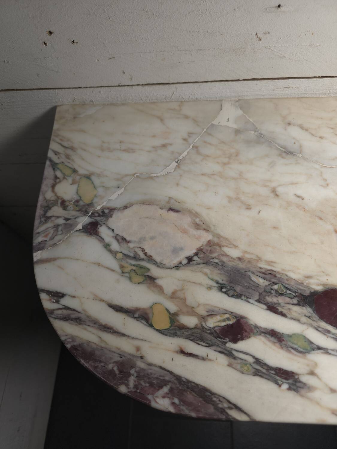 Louis XVI style console in gilded wood with a marble top.