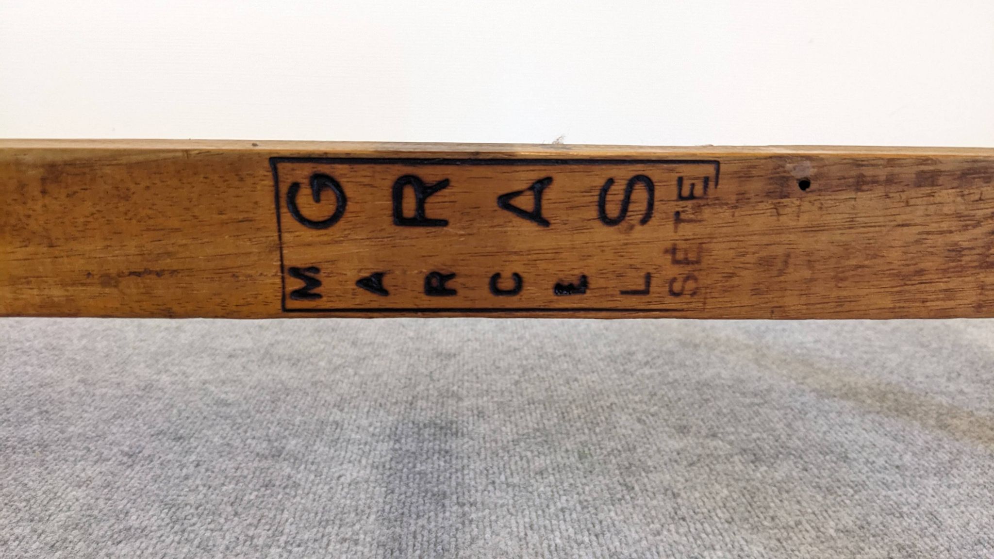Wooden slatted display bench or support, France circa 1960.