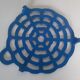Old blue vintage enamelled table mat
