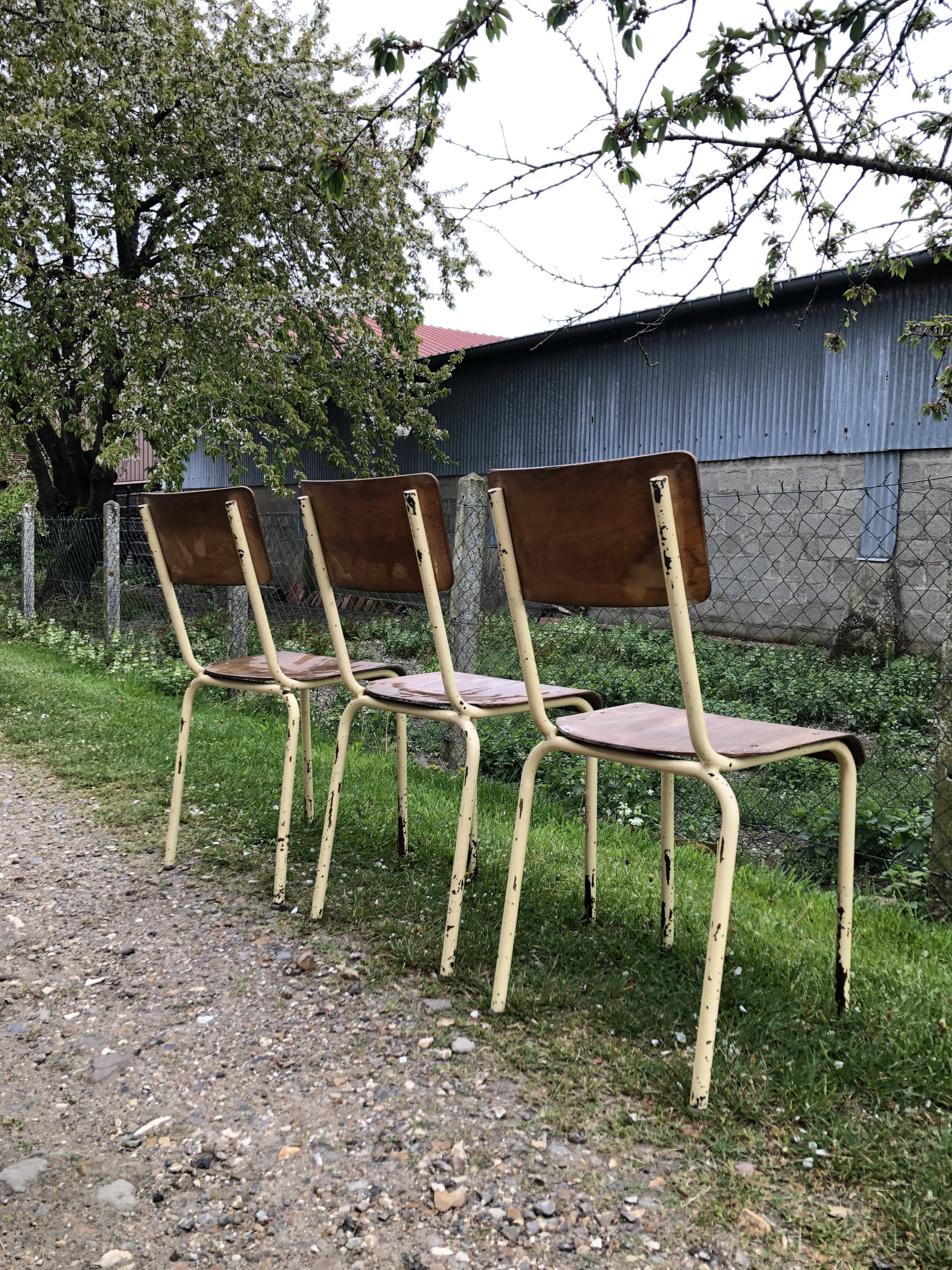 Three vintage school chairs
