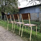 Three vintage school chairs