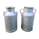 set of 2 old aluminum milk jugs