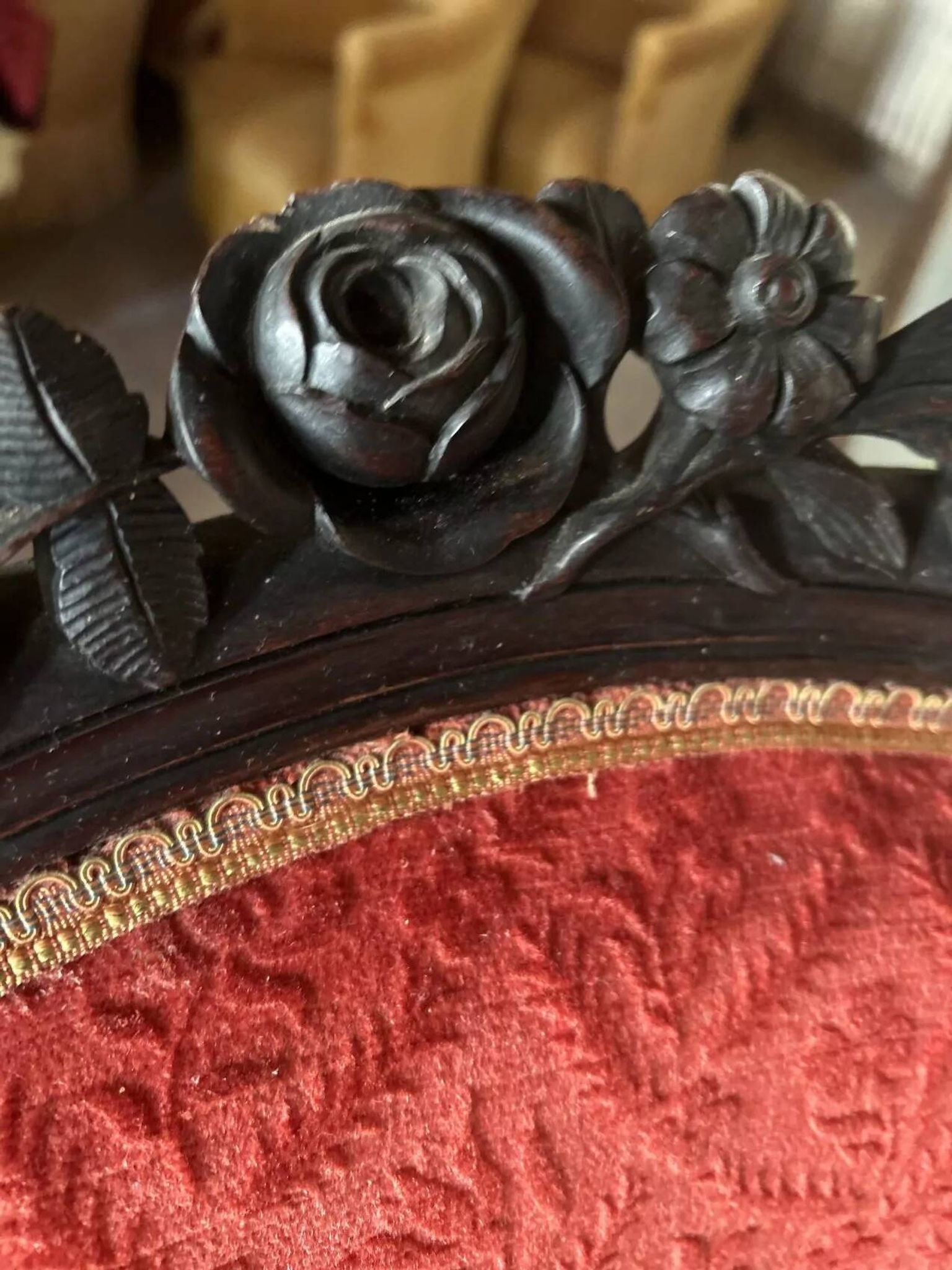 Napoleon III medallion armchair in carved wood and red velvet.