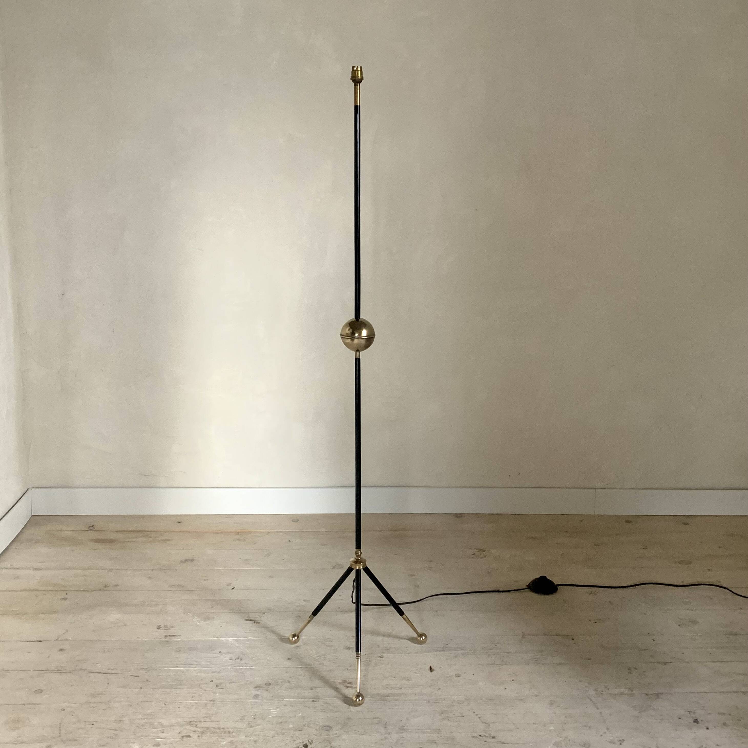 Vintage black metal tripod floor lamp and brass ball