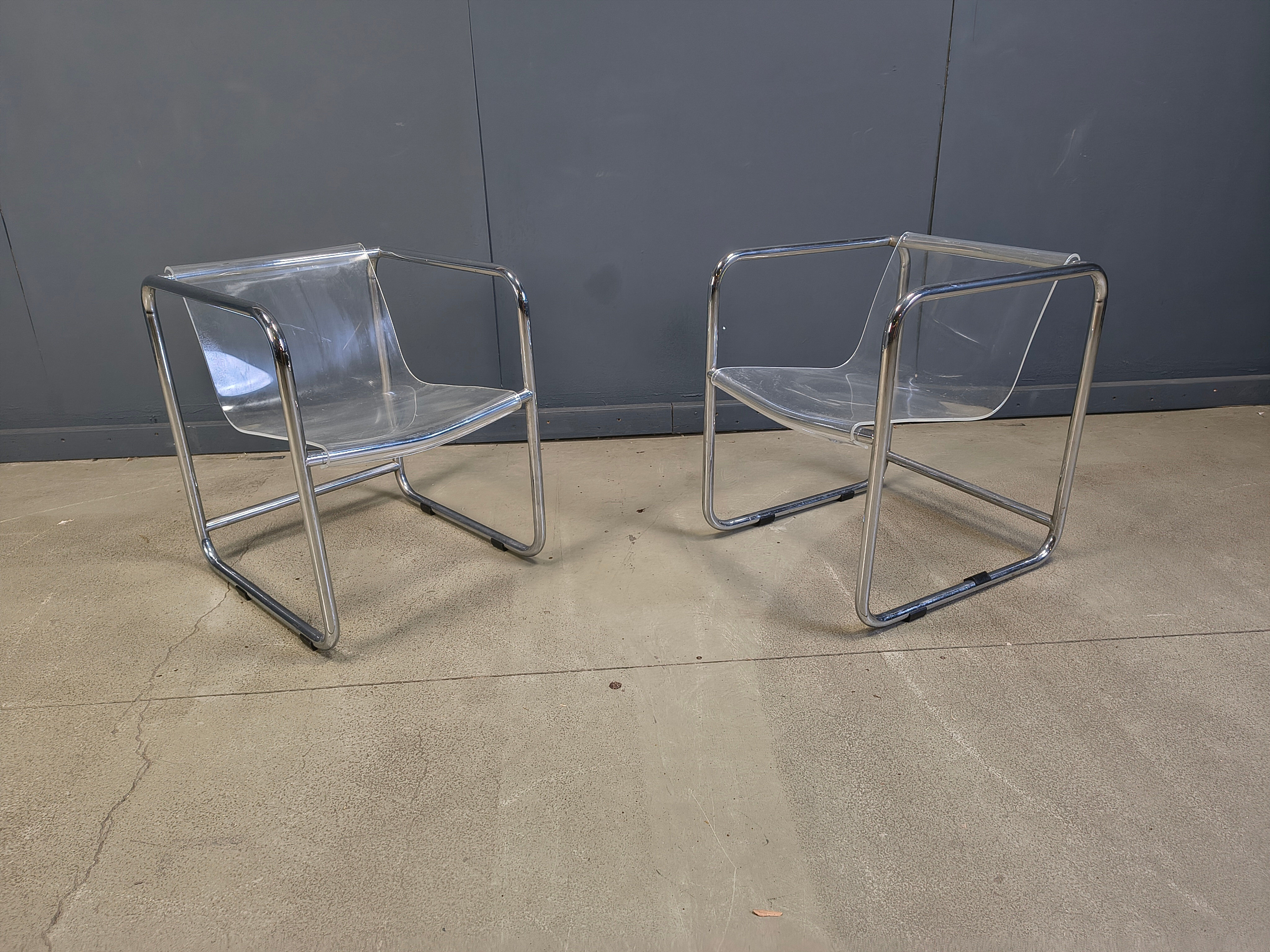Pair of plexiglass and tubular chrome armchairs, 1970s