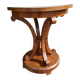 Art Deco side table in brown walnut, round top and scroll legs, France 1930s.