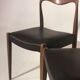 Suite of 4 chairs in teak and skai